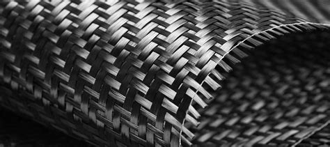 Carbon Fiber Reinforced Polymer - A Revolutionary Material for Aerospace Applications and High-Performance Sports Equipment!